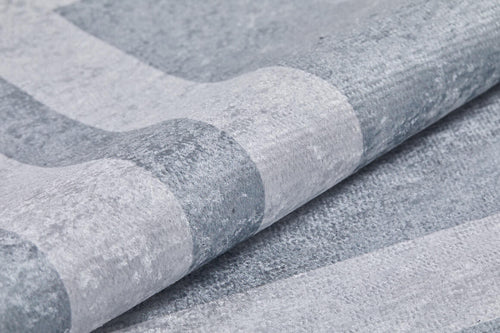 Load image 1 in gallery view. Close-up of the Refined Edge - Washable Rug - JR573 (Custom Size), featuring a soft, textured gray-anthracite surface with subtle stripes in light and medium gray—durable, velvety, and ideal for high-traffic areas.