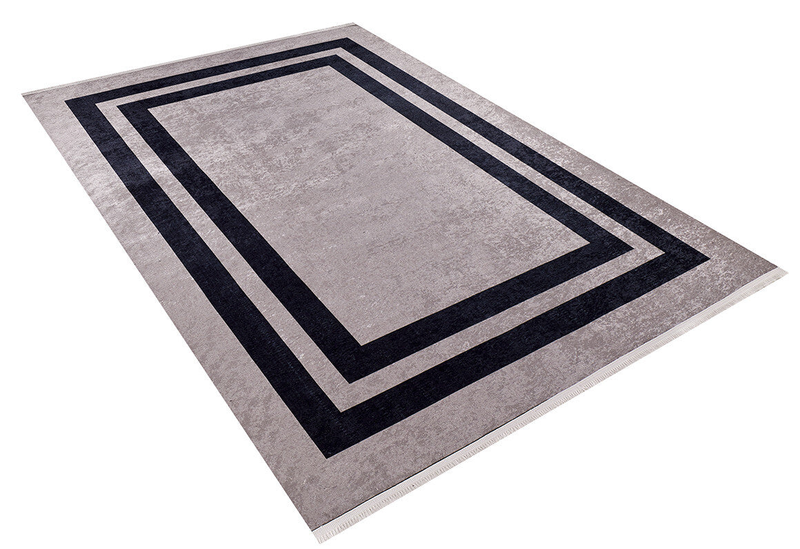 The Regal Trellis - Washable Rug - JR601 (Custom Size) features a rectangular shape with a light gray base and two bold black borders. Shown angled on a white background, it's ideal for high-traffic areas and easy to clean.