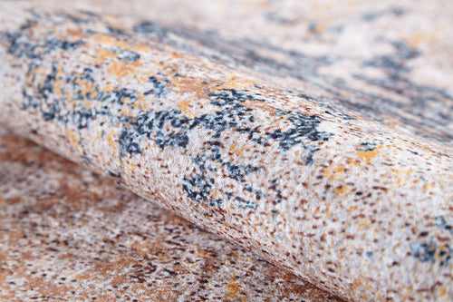 Load image 1 in gallery view. A close-up of the Rhythmic Ripples - Washable Rug - JR1637 (Custom Size), showcasing its rolled, textured flat weave with a mottled beige, brown, orange, and dark gray pattern. Soft, dense fabric offers style and easy cleaning.