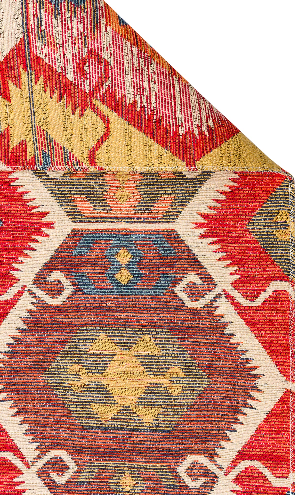A close-up of the Ruby Grain - Kilim - NMD06 showcases its vibrant geometric tribal patterns in red, yellow, blue, and cream. The folded corner highlights the detailed flatwoven polyester design on both sides.