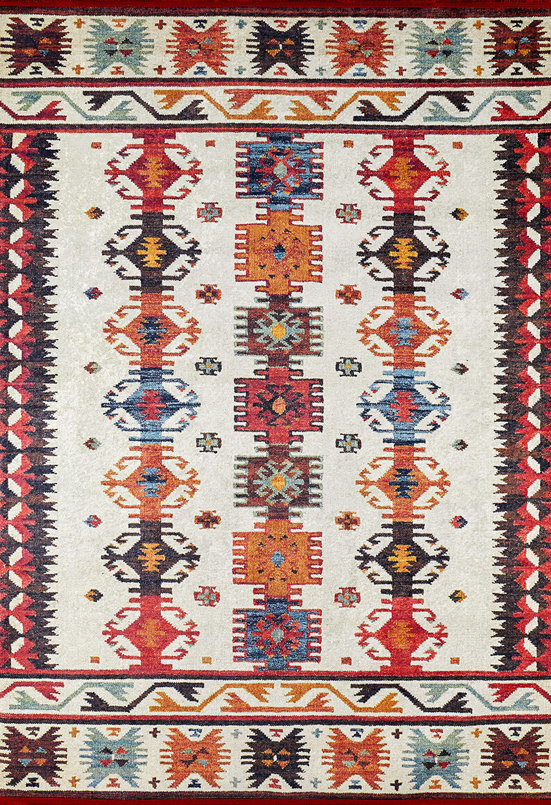 The Rustic Refrain - Washable Rug - JR149 (Custom Size) is a colorful rectangular flat weave with a geometric, tribal-inspired pattern in red, orange, blue, black, and beige tones and symmetrical motifs on a light background.