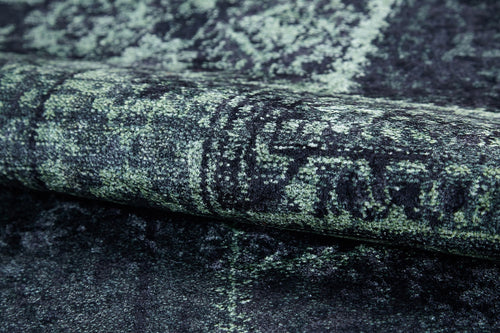 Bild 1 in Galerieansicht laden. A close-up of the Rustic Remix - Washable Rug - JR1710 (Custom Size) showcases its dark green and black abstract pattern, textured surface, and durability—perfect for high-traffic areas.