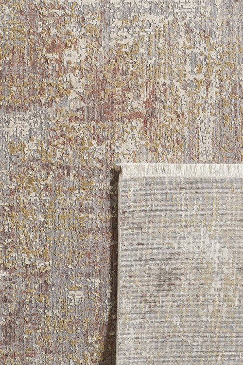 Load image 1 in gallery view. The Sandy Whisper Neutral Rug - M628M is a rectangular, machine-made rug featuring a textured abstract pattern in muted gray, gold, beige, and touches of red. One corner is flipped to show the underside and fringe detailing.