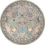 The Seraphix Pastel Bordered Washable Rug - LCC3011 is a round blue rug with ornate geometric and floral patterns in muted pastels and a decorative border. It’s stylish, easy to maintain, and ideal for high-traffic areas.