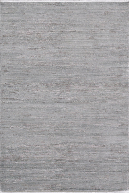Load image 1 in gallery view. The Silver Lining Grey Rug - M352I is a large, rectangular light gray minimalist rug with a subtle textured pattern and smooth surface.