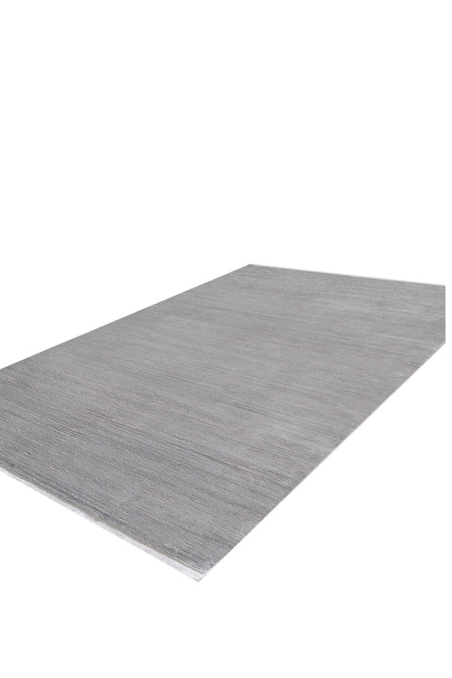 Load image 1 in gallery view. The Silver Lining Grey Rug - M352I is a large, rectangular flat pile rug in light gray with a subtle textured pattern, displayed on a white background.