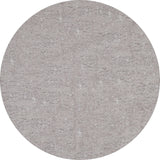 The Slate Charm - Washable Rug - JR1740 features a circular, light gray textured surface that mimics concrete or stone, making it perfect for high-traffic areas. Displayed here against a clean white background.