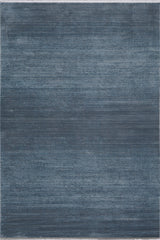 The Slate to Midnight Navy Rug - M497M is a large rectangular modern rug with a textured, painterly pattern in blue and gray shades, creating a subtle gradient effect.