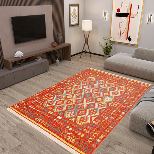 Load image 1 in gallery view. A modern living room with light wood floors, a Soft Mosaic - Washable Reversible Kilim - NMD08, gray sectional sofa, floor lamp, wall art, TV on a wooden accent wall, and a low console with decor items.