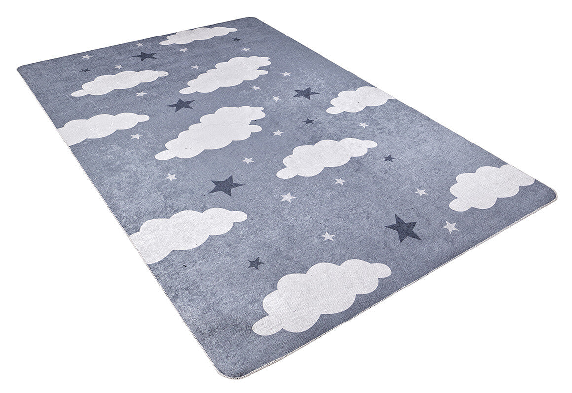 The Starry Cloudscape - Machine-Washable Rug JRC045 (Custom Size) features a blue-gray background with white clouds and dark blue stars in various sizes, shown at an angle on a white surface.