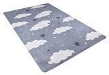 The Starry Cloudscape - Machine-Washable Rug JRC045 (Custom Size) features a blue-gray background with white clouds and dark blue stars in various sizes, shown at an angle on a white surface.