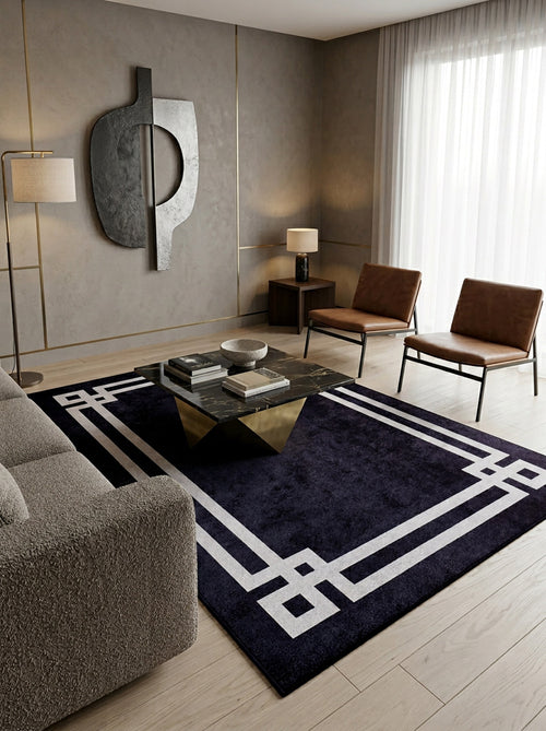 Bild 1 in Galerieansicht laden. A modern living room featuring a gray textured sofa, two brown leather chairs, the Subtle Border - Washable Rug - JR597 (Custom Size), a glass-top coffee table, abstract wall art, floor and table lamps, and sheer curtains on large windows.