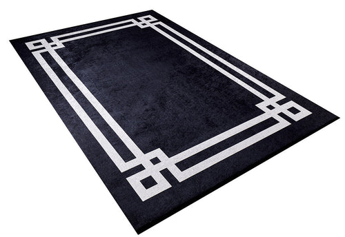 Bild 1 in Galerieansicht laden. The Subtle Border - Washable Rug - JR597 (Custom Size) is a rectangular black rug with a geometric white double-line border and interlocking corners, ideal for high-traffic areas and shown on a white background.