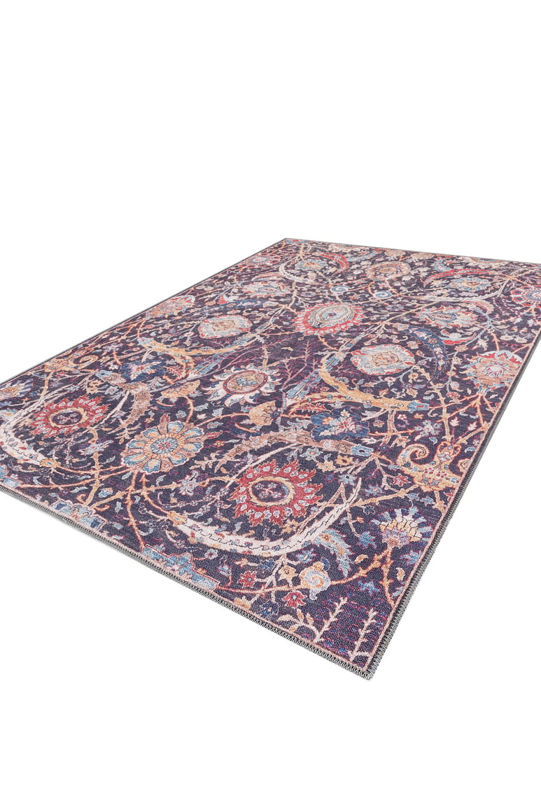 The Sylvanor Colorful Washable Rug - LCC3017 (Custom Size) showcases an intricate floral and vine design on a deep purple base, viewed from a low angle—ideal for high-traffic areas.