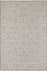 The Timeless Petals Oushak Rug - Silver - M621O is a luxury area rug with a light gray background and an intricate floral and vine pattern in beige, cream, gold, and muted red, finished with an ornate cream and gold border. Machine-made for elegance and durability.