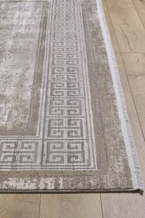 Load image 1 in gallery view. A close-up of the Timeless Remix Bordered Rug - Cream - MT189, a rectangular machine-made acrylic-viscose rug with a light gray and beige Greek key border and a slightly distressed, textured look, shown on a wooden floor.