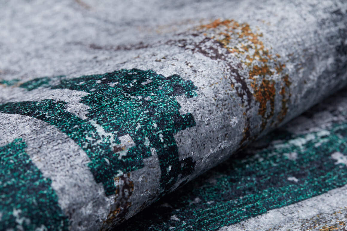 A close-up of the Traditional and Classic - Washable Rug - JR1543 (Custom Size) showcases its allergy-friendly, textured weave and subtle pixelated pattern in green, gray, and gold tones.