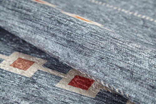 Load image 1 in gallery view. Close-up of the Tuscan Villa - Washable Rug - JR5058 (Custom Size), featuring a textured gray-anthracite surface with red and beige geometric diamond motifs. Soft, plush, and washable—the perfect choice for high-traffic spaces.