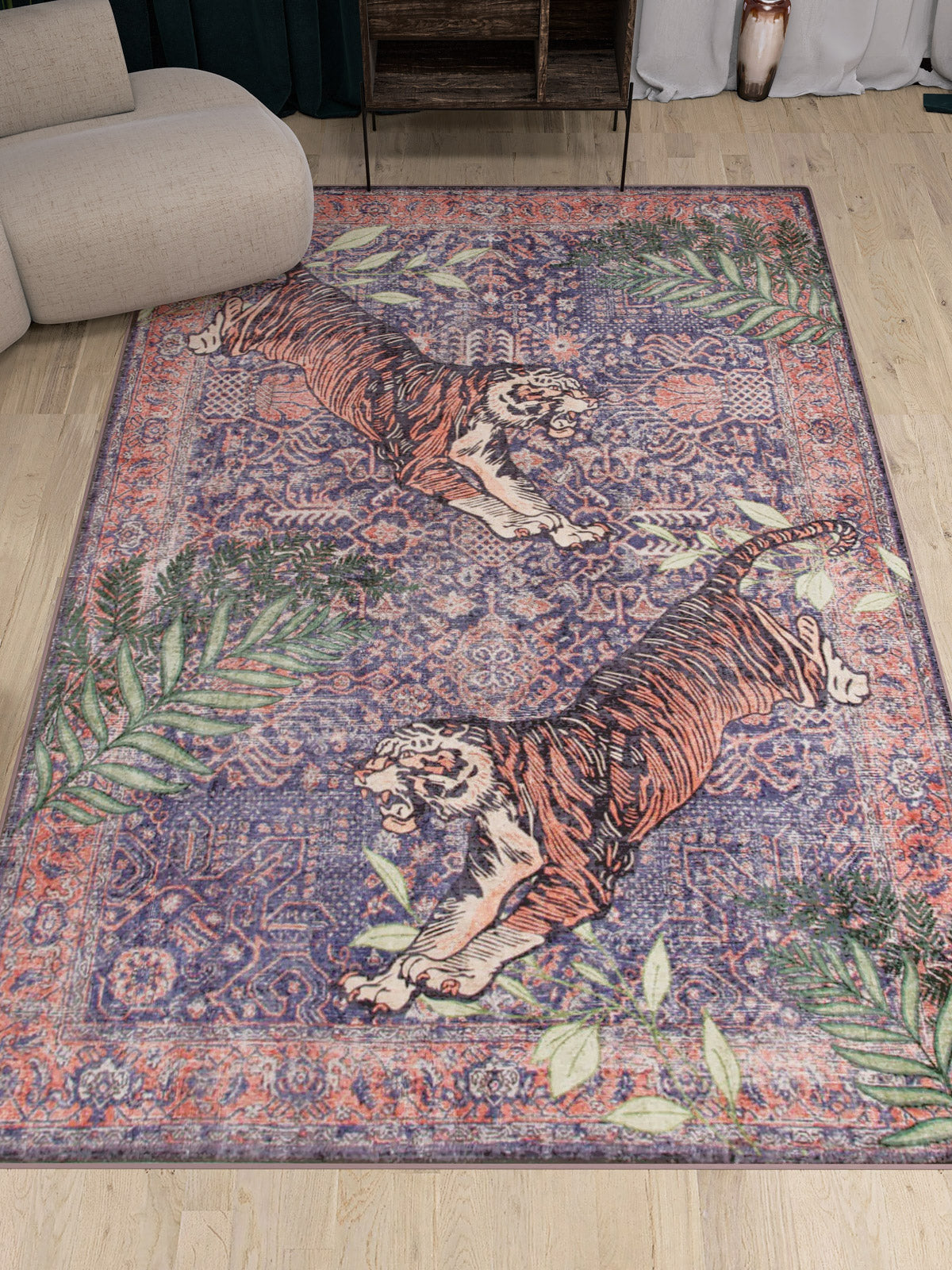 The Stormstripe Echo - Washable Rug (JR0046) features two illustrated tigers facing opposite directions amid green leaves on a purple and pink ornate background, adding vibrant style to any light wooden floor.