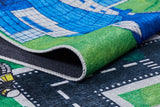 Close-up of the Urban Road - Machine-Washable Rug JRC013 (Custom Size) showing a curved corner, illustrated roads, green areas, and a blue-and-white building—perfect for toy cars and high-traffic spaces.