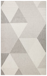 The Urban Thread - Kilim - MNO03 is a flatwoven polyester rug with overlapping triangles and quadrilaterals in gray, white, and beige tones, offering a modern abstract look.
