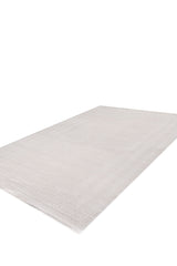 The Vanilla Dream Modern Bordered Rug - EW2742 is a large, rectangular, light beige machine-made rug with a subtle textured pattern, displayed on a white background.