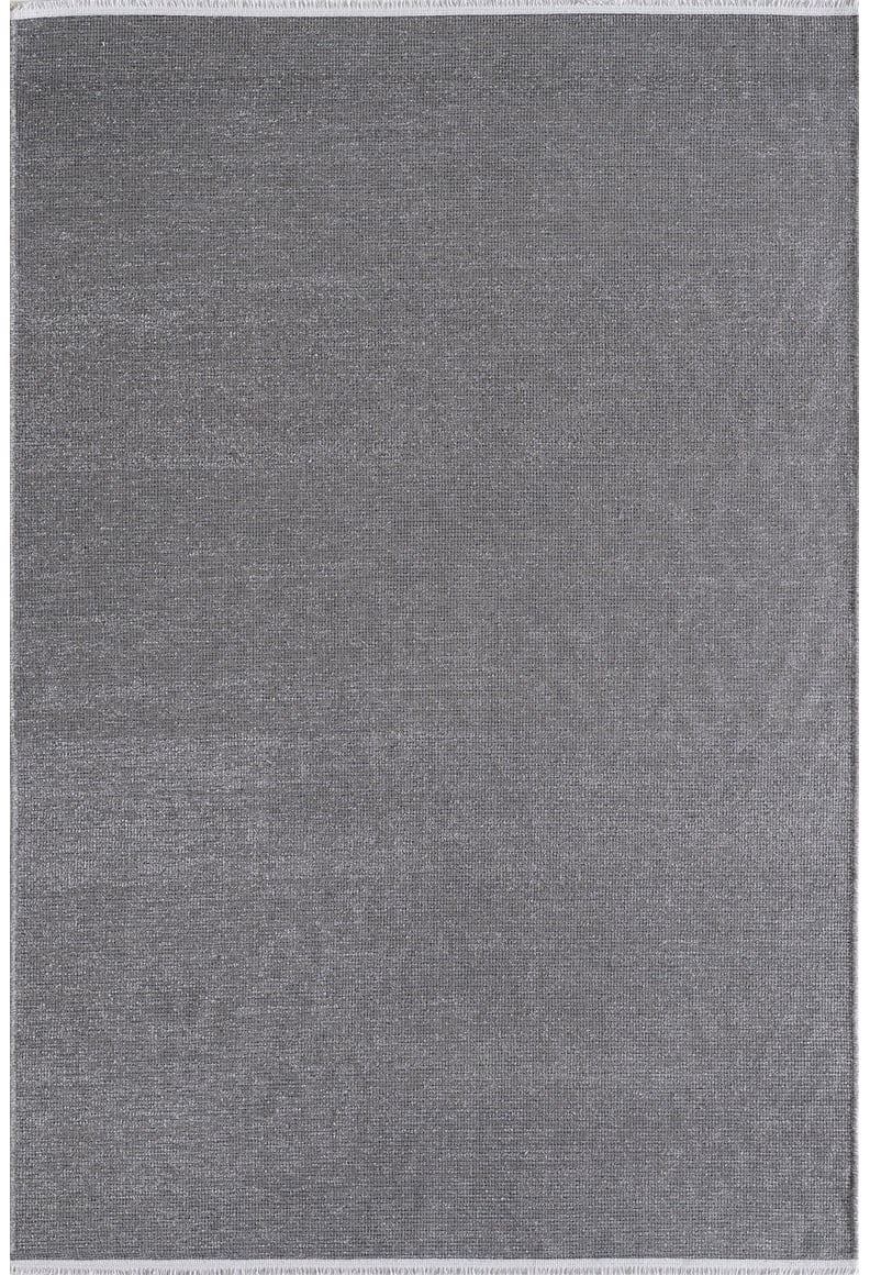 The Velvet Touch Dark Gray Area Rug - PST005 is a rectangular, flat-woven contemporary rug with subtle texture and minimal pattern, shown from above on a plain background.