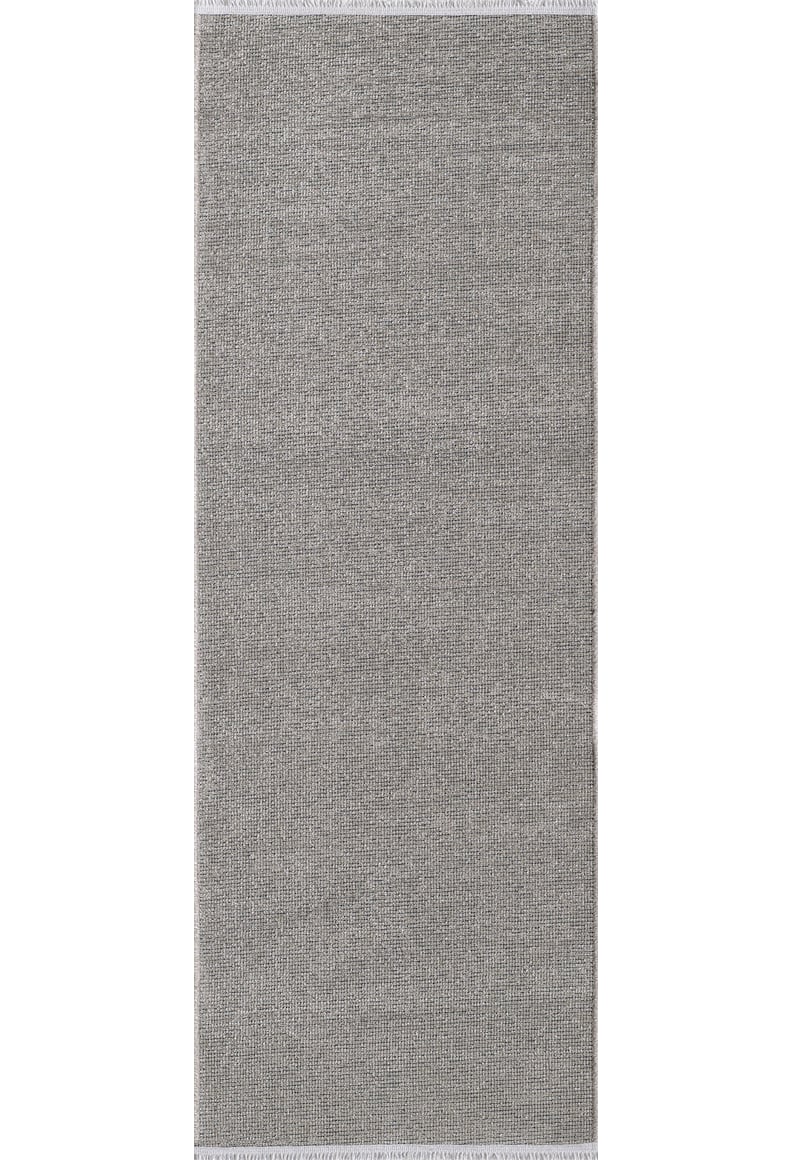 The Velvet Touch Gray Area Rug - PST003 features a rectangular shape, subtle woven texture, and white borders on the short sides—perfect for fans of minimalist design.