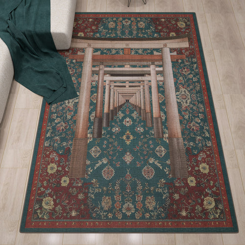 Load image 1 in gallery view. The Verdant Frame - Washable Rug (JRS022) features torii gates and geometric floral motifs in red, green, and gold. Its rectangular shape looks stunning on wooden floors beside a green blanket and sofa—ideal for contemporary interiors.
