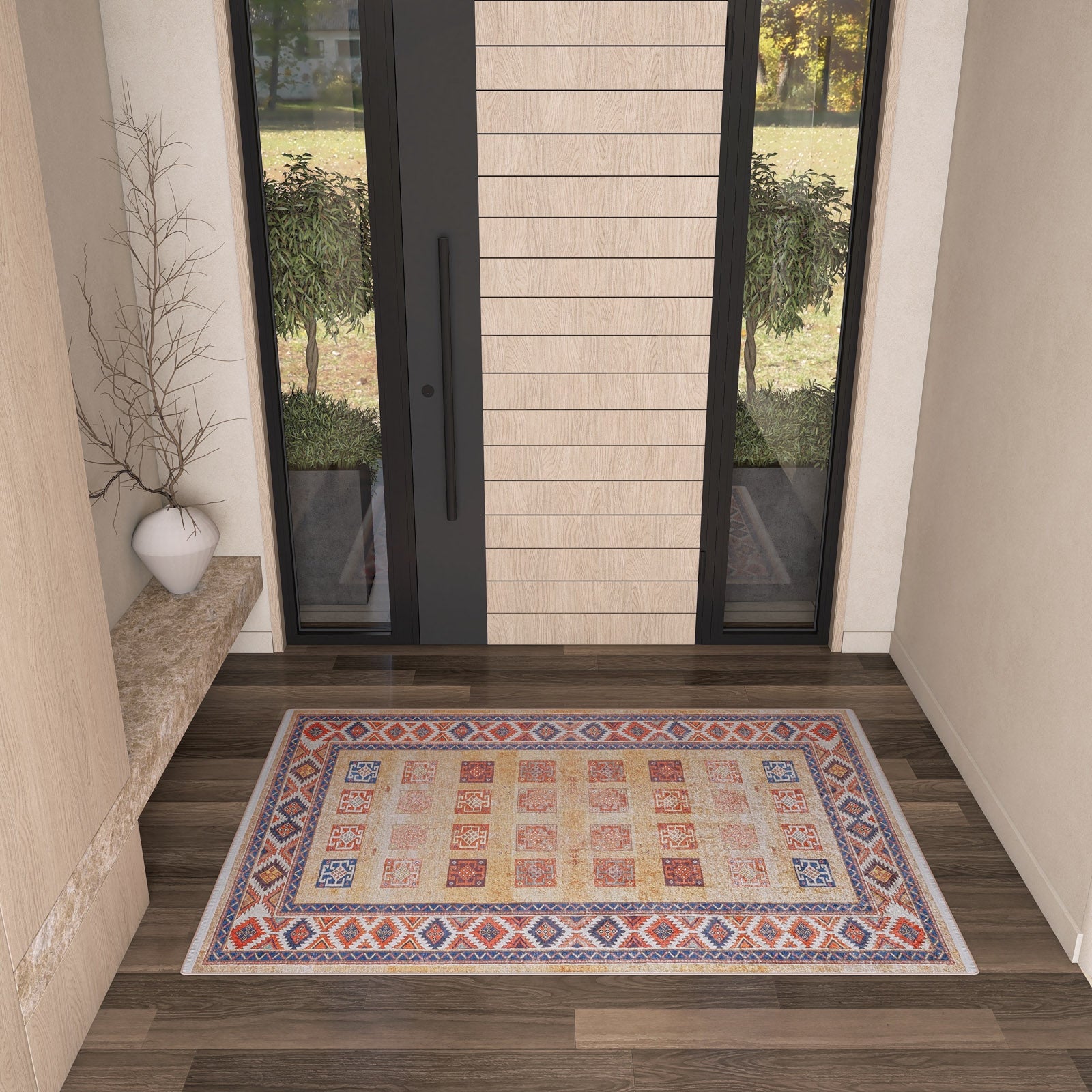 The Navajo Nights - Washable Rug - JR1758 (Custom Size), featuring bold geometric patterns in red, blue, beige, and orange accents, is showcased on dark wood flooring in a stylish entryway—ideal for high-traffic areas.
