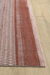 A close-up of the Vibrant Bohemian Trellis Rug - HRD009, featuring a red and white geometric pattern. This machine-made viscose-polyester rug has a textured look, neatly finished edges, and sits on a light wooden floor.