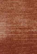 A close-up of the Vintage Reverie - Washable Rug - JRN31 reveals its textured, reddish-brown fabric with deep red hues and subtle horizontal lines for a soft, velvety, ombre-inspired look.