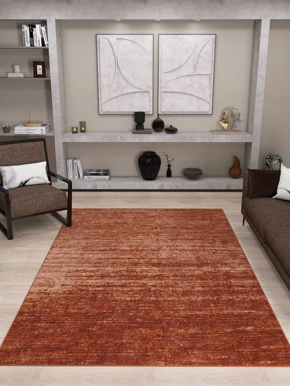 A modern living room featuring the Vintage Reverie - Washable Rug - JRN31 in deep red ombre, a brown sofa, armchair, open shelves with decor, and two abstract artworks above a concrete shelf.