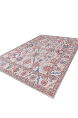 The Vivencia Authentic Washable Rug - LCC3016 (Custom Size) is a large rectangular rug with intricate floral and geometric patterns in red, blue, pink, and beige—perfect for allergy-sensitive homes—shown angled on a white background.