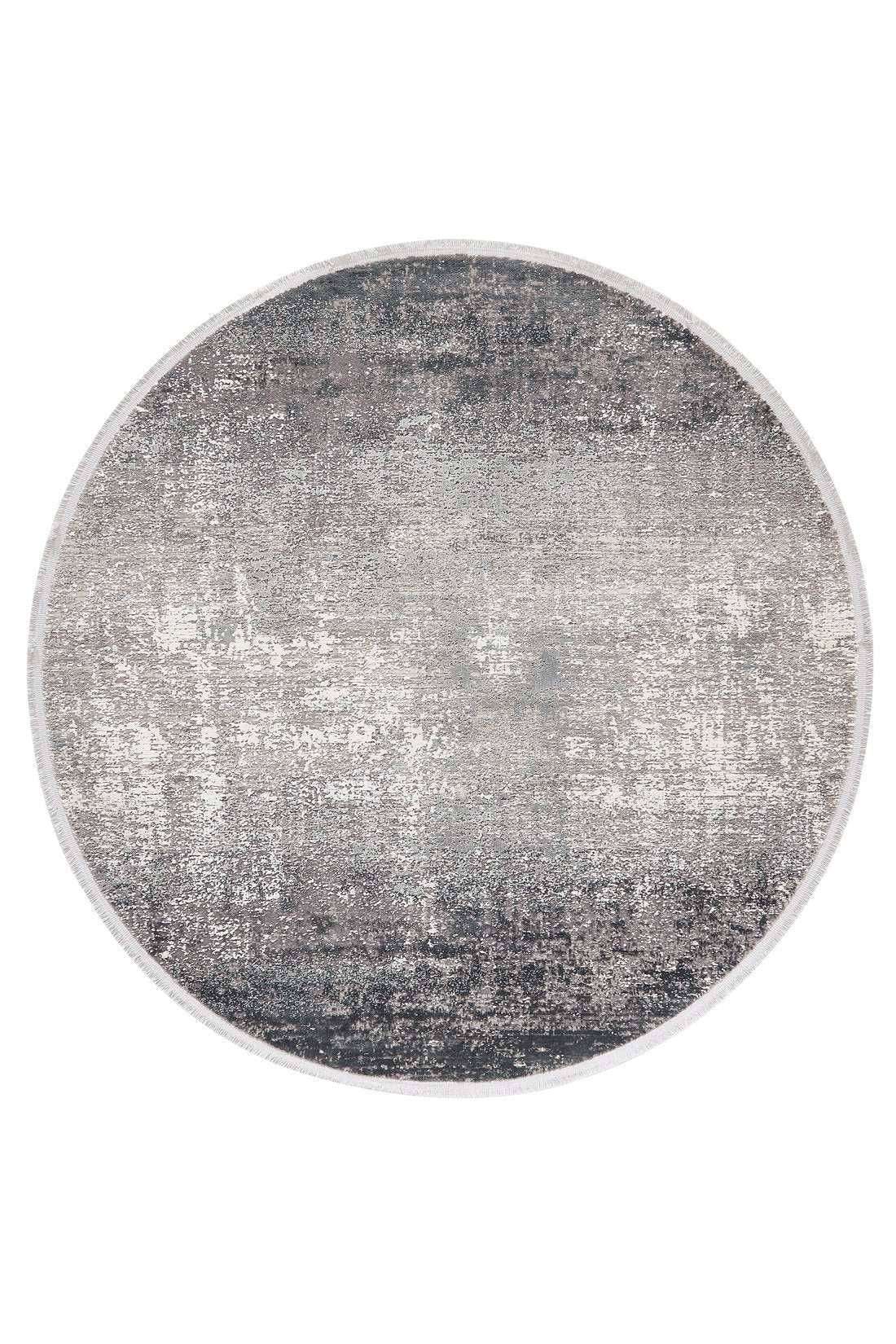 The Vortexia Silver Premium Rug - M472A is a round, machine-made rug with a distressed, textured pattern in gray, white, and black for a modern look in neutral tones.