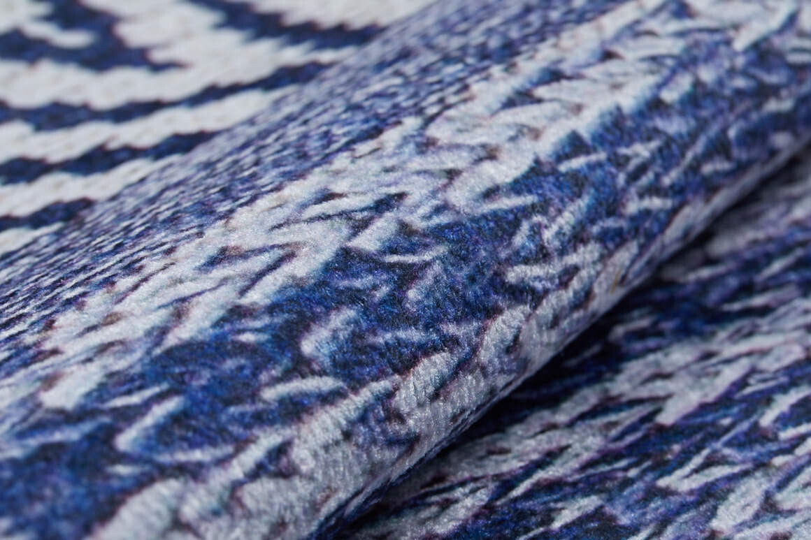 Close-up of the Wavy Wonders - Washable Rug - JR941 (Custom Size) showcasing its textured surface with a wavy zigzag pattern in blue, white, and gray. The soft, foldable rug is washable and perfect for high-traffic areas.