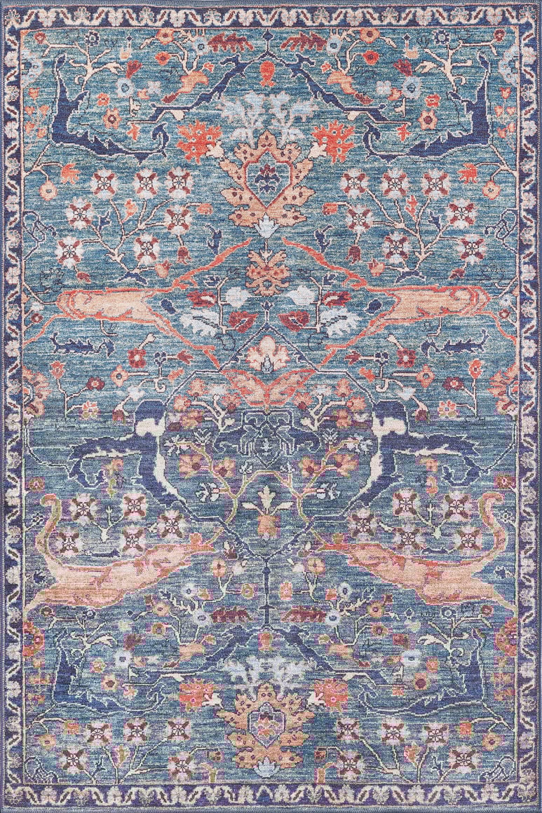 The Whisper Authentic Blue Washable Rug - LCC3034 features a symmetrical floral and vine pattern in blue, coral, ivory, and gold. Its durable, washable design makes it perfect for high-traffic areas while elevating any space with elegance.