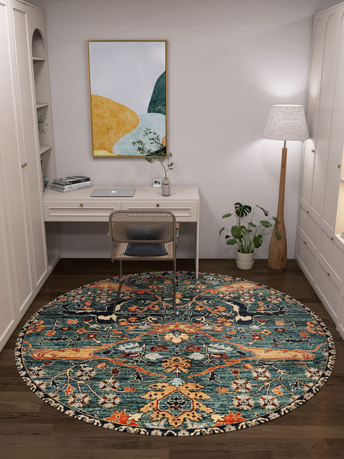 Load image 1 in gallery view. A small home office with a white desk, chair, lamp, plant, abstract art, and built-in shelves features the Whisper Authentic Blue Washable Rug - LCC3034 (Custom Size), adding stylish practicality for high-traffic areas.