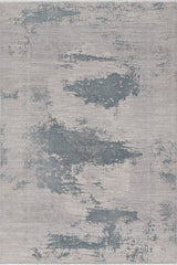 The Whispering Mist Modern Rug - Silver - HRD002 is a rectangular, machine-made rug with an abstract design in muted grey and blue tones, featuring a modern distressed look.