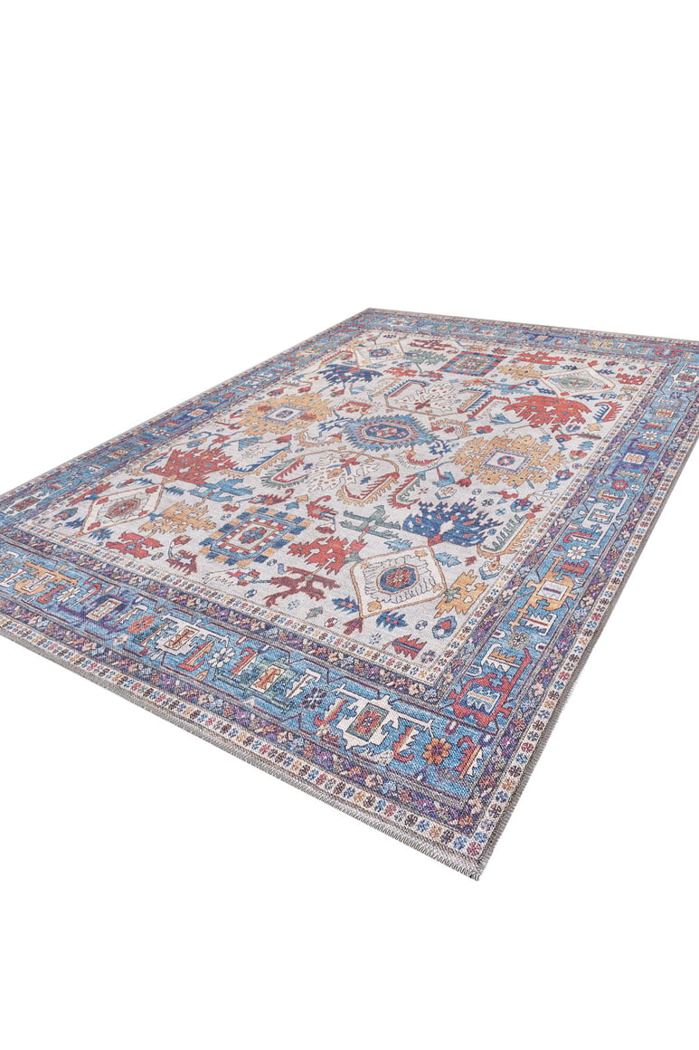 The Yonder Blue Cream Washable Rug - LCC3045 (Custom Size) is a large rectangular rug featuring an intricate geometric multicolor pattern in blue, red, orange, and purple with a detailed border. Displayed on a white background.