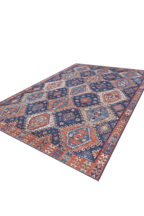 Load image 1 in gallery view. The Zephyro Kilim-Design Washable Rug (LCC3008) showcases blue, orange, red, and cream hexagons and diamonds on a white backdrop—ideal for high-traffic spaces.