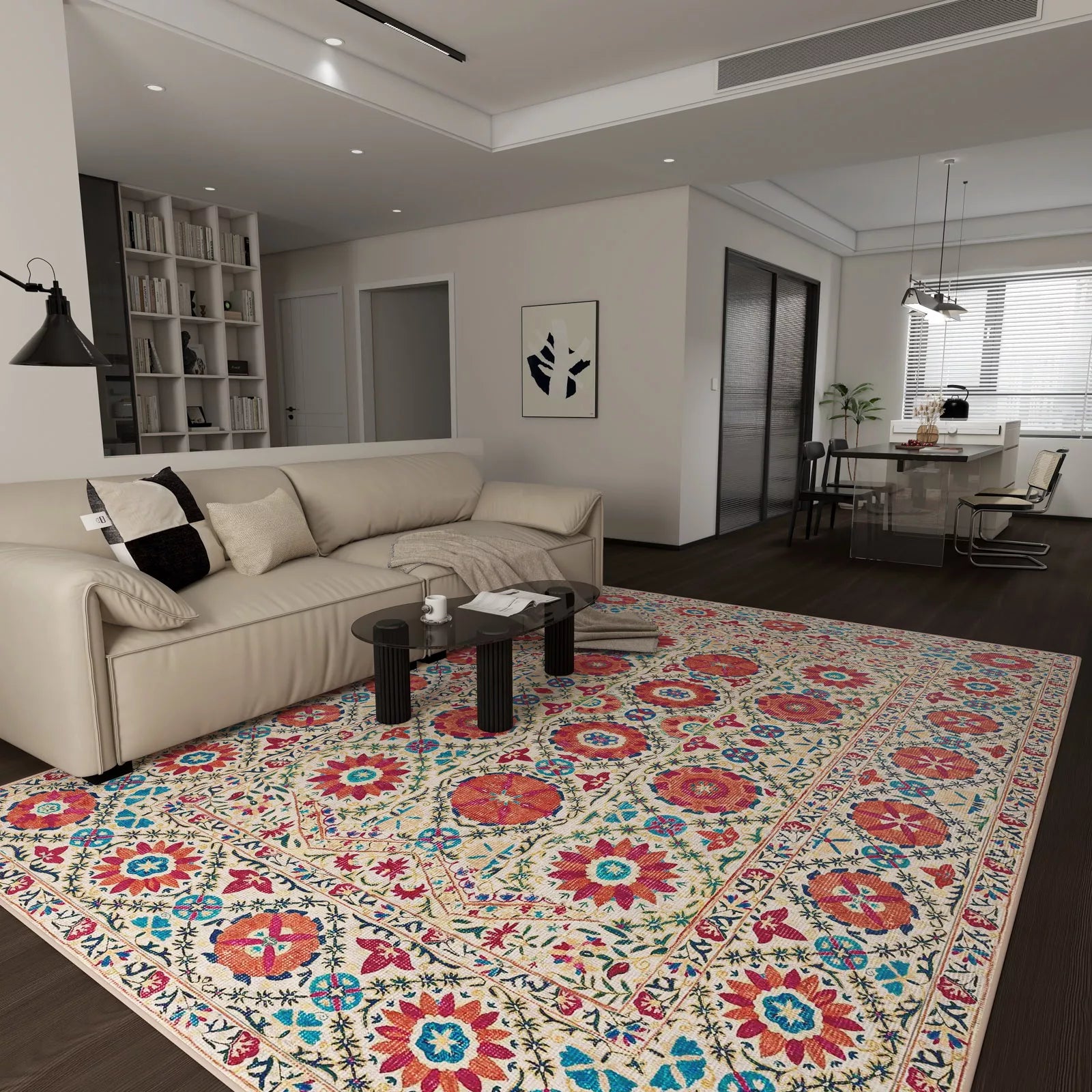 Living room with a colorful floral rug, beige sofa, and modern decor.