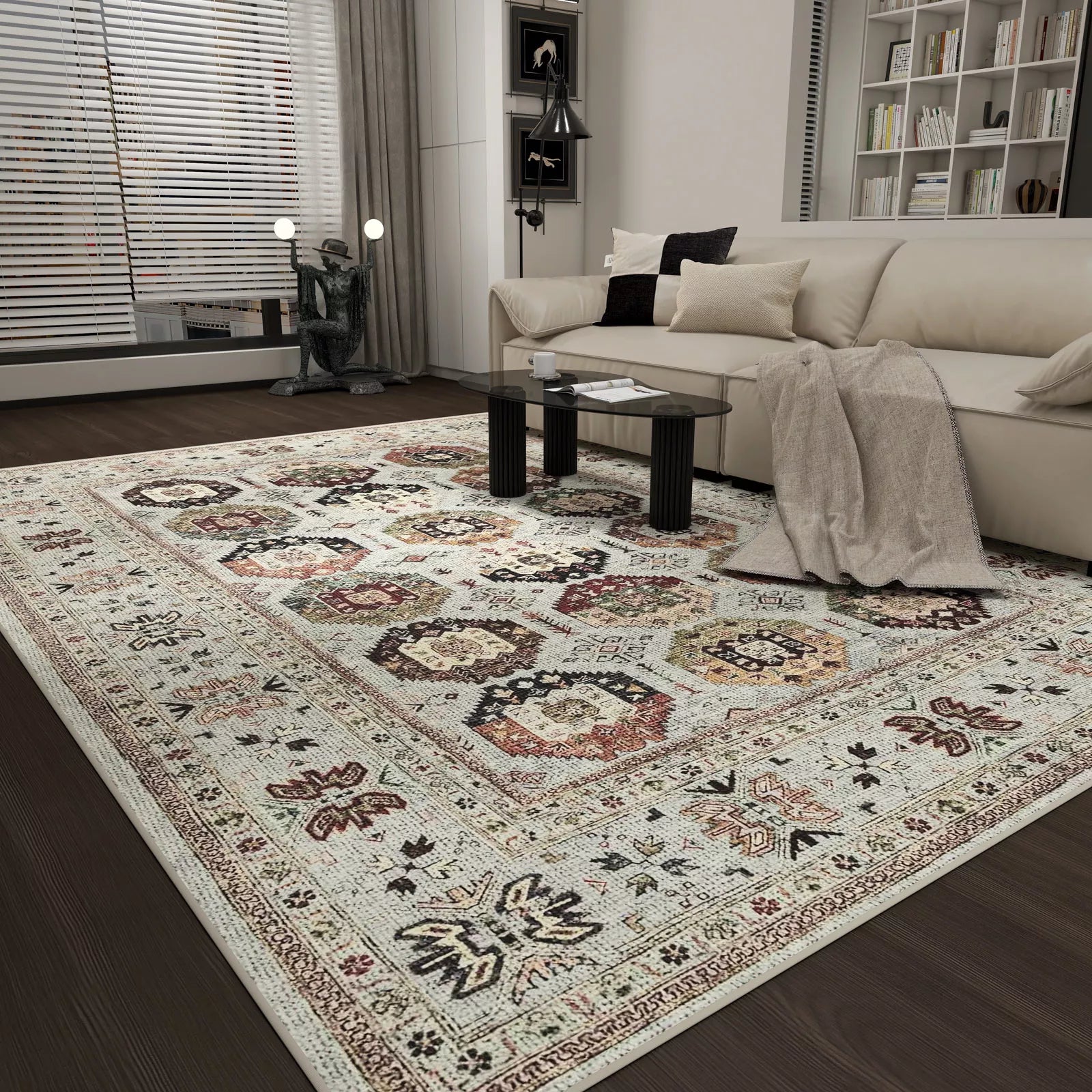 Living room with a patterned rug, sofa, and coffee table.