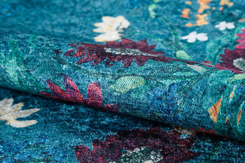 Load image 1 in gallery view. A close-up of Nature's Tapestry - Washable Rug - JR1674 (Custom Size) shows its vibrant, multicolored floral pattern with red, yellow, and white flowers on a blue-green background—perfect for high-traffic areas.