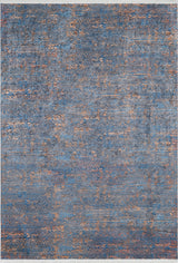 The Abstract Harmony - Machine-Washable Rug JR1882 features a large, allergy-friendly design with a textured abstract pattern in blue and copper tones, creating a stylish weathered look that's easy to clean.