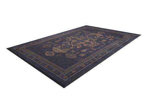 Load image 1 in gallery view. The Ancient Legacy - Washable Rug - JR1890 is a rectangular, dark-colored rug with an ornate faded gold geometric and floral design and decorative border, ideal for high-traffic areas, shown angled on a white background.