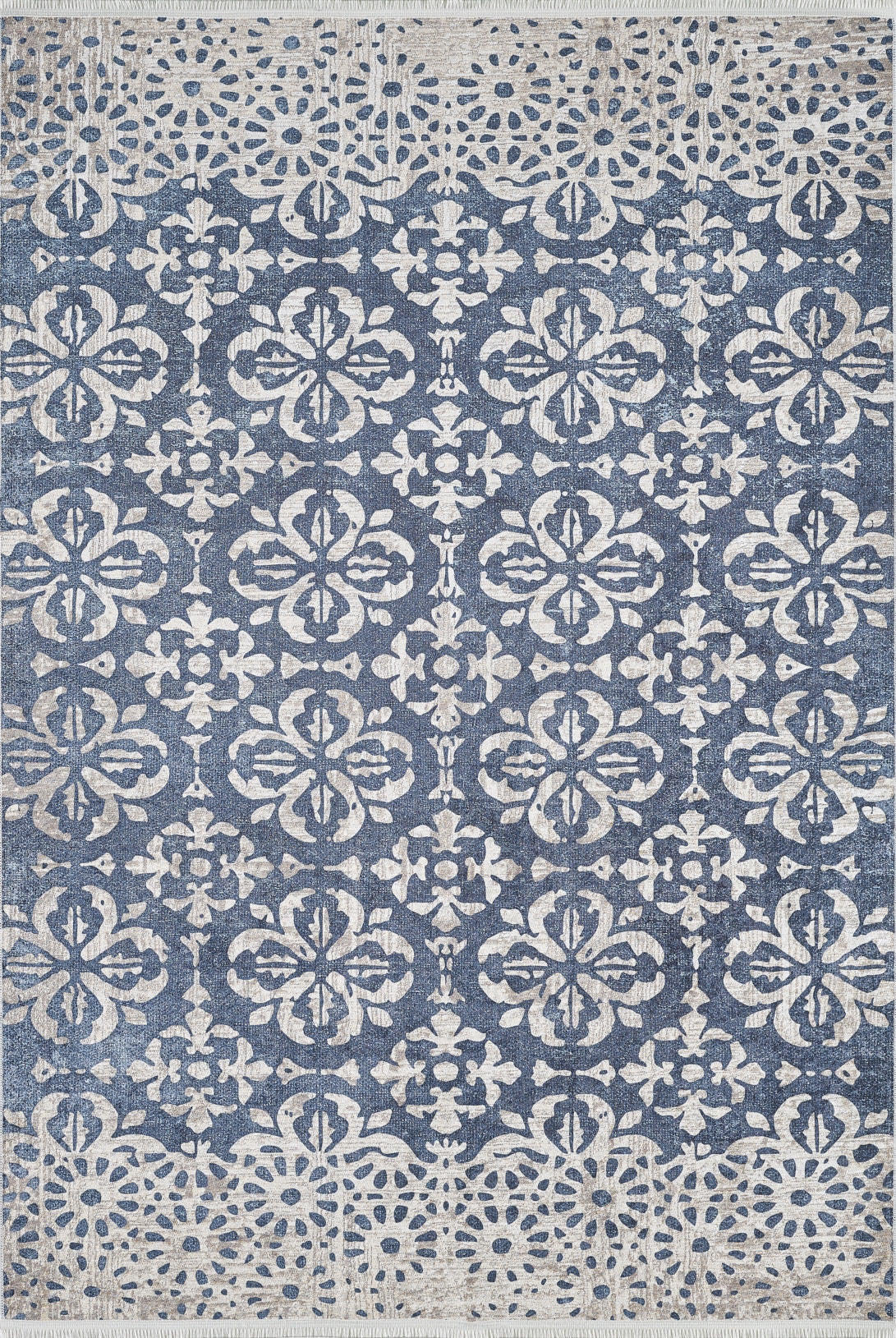 The Antique Flourish - Washable Rug - JR1591 is a blue rug with intricate white floral and geometric patterns, a decorative border, and distressed vintage details—perfect for high-traffic areas.