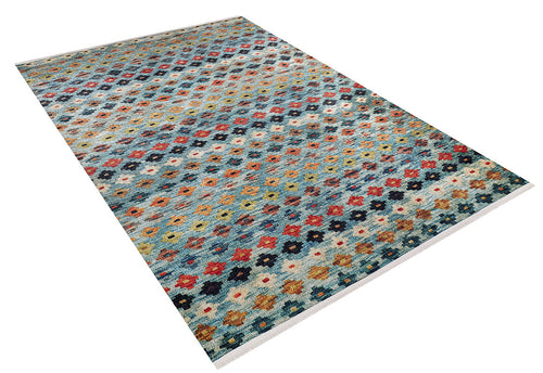 Load image 1 in gallery view. The Aztec Ambience - Washable Rug (JR1086) features a geometric diamond pattern in multicolor on a blue background with white fringes. Its washable design makes it ideal for high-traffic areas in your home.