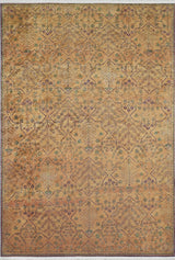 The Blossom Breeze - Washable Rug - JR1752 features a vintage, ornate look with intricate geometric and floral patterns in muted gold, brown, green, and purple. Its flat weave design is practical and washable with symmetrical repeating motifs.