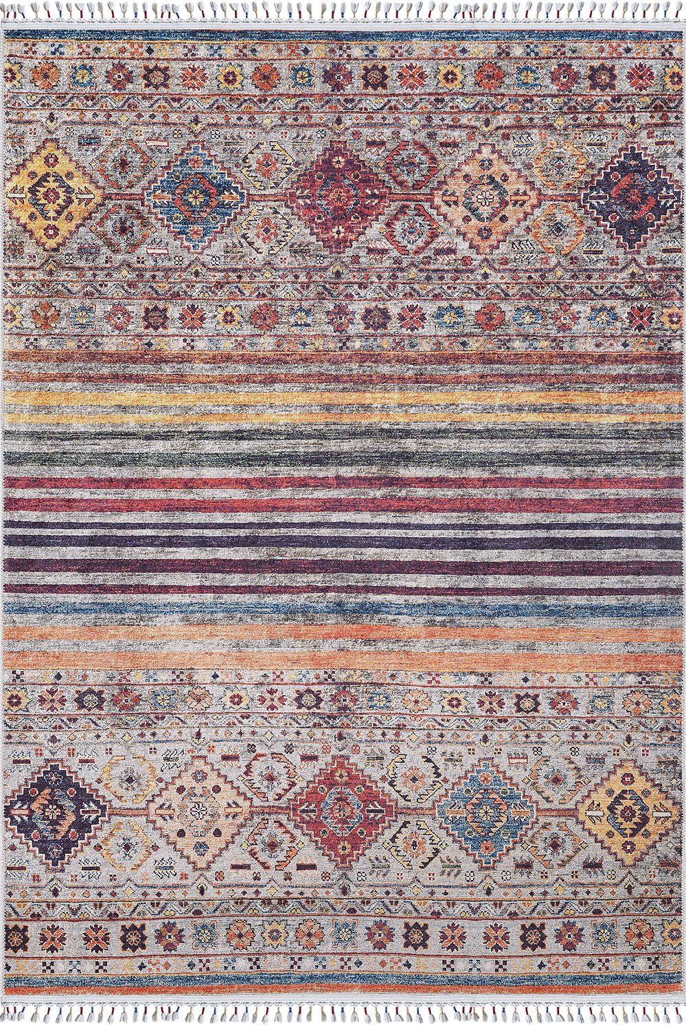 The Bohemian Bouquet - Washable Rug - JR5090 features vibrant multicolor geometric patterns, including diamonds and floral motifs in red, yellow, blue, and orange. With allergy-friendly materials, it has horizontal stripes and decorative fringes on both ends.